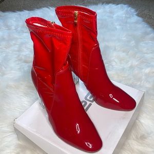 Red patent leather boot with clear block heel